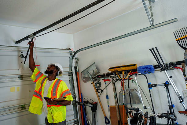 Professional Garage Door Panel Replacement technician working in Cayuga County County, NY